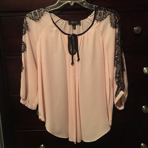 Light pink and black lace blouse